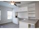 Bedroom with built-in desk and ceiling fan at 5213 Dunewood Way, Avon, IN 46123