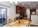 Eat-in kitchen with dining area and view to backyard at 5213 Dunewood Way, Avon, IN 46123
