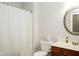 Clean bathroom with a toilet, sink, and shower at 5213 Dunewood Way, Avon, IN 46123