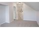Upper hallway with chandelier and access to upper-level rooms at 5213 Dunewood Way, Avon, IN 46123