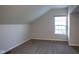 Bright bedroom with window and neutral carpeting at 5213 Dunewood Way, Avon, IN 46123