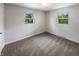 Bright bedroom with neutral walls and carpet at 4013 N Graham Ave, Indianapolis, IN 46226