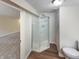 Basement bathroom with a shower stall and vinyl flooring at 4013 N Graham Ave, Indianapolis, IN 46226
