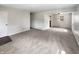 Spacious living room with neutral carpeting and natural light at 4013 N Graham Ave, Indianapolis, IN 46226