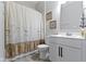 Clean bathroom with a shower/tub combo and white vanity at 17084 Cole Evans Dr, Noblesville, IN 46060