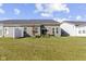 Spacious backyard with a patio and grassy area at 17084 Cole Evans Dr, Noblesville, IN 46060
