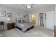 Spacious bedroom with carpeted floor and en-suite bathroom at 17084 Cole Evans Dr, Noblesville, IN 46060