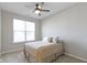 Cozy bedroom with ceiling fan and neutral color palette at 17084 Cole Evans Dr, Noblesville, IN 46060