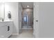 Bathroom with double vanity and a large walk-in shower at 17084 Cole Evans Dr, Noblesville, IN 46060