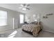 Spacious bedroom with ceiling fan and built-in storage at 17084 Cole Evans Dr, Noblesville, IN 46060