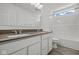 Bathroom boasts double sinks, a large mirror, and a bathtub at 4168 Dutton Dr, Bargersville, IN 46106