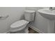 Clean bathroom with pedestal sink and toilet at 4168 Dutton Dr, Bargersville, IN 46106