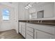 Double vanity bathroom with a large mirror and window at 4168 Dutton Dr, Bargersville, IN 46106