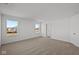 Bright bedroom with neutral carpeting and large windows at 4168 Dutton Dr, Bargersville, IN 46106