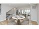 Bright dining area with a marble table and seating for six at 7284 County Road 600 W, McCordsville, IN 46055