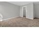 Well-lit bedroom with neutral walls and carpet flooring at 7244 Birch Leaf Dr, Indianapolis, IN 46259