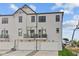 Modern townhouses featuring two-car garages and balconies at 4190 Douro Trl, Westfield, IN 46062