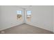 Well-lit bedroom with corner windows and neutral carpet at 4190 Douro Trl, Westfield, IN 46062