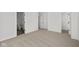 Spacious bedroom with carpeting, private bathroom, and walk-in closet at 4190 Douro Trl, Westfield, IN 46062