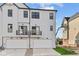 Modern townhouses featuring two-car garages and balconies at 4190 Douro Trl, Westfield, IN 46062