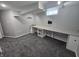 Finished basement office with desk and grey carpeting at 5531 Maplewood Dr, Indianapolis, IN 46224