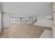 Open concept basement with kitchen, fireplace and hardwood floors at 4988 Amber Crest Dr, Brownsburg, IN 46112