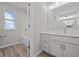 Bathroom with vanity, quartz countertop, and a shower/tub combo at 4988 Amber Crest Dr, Brownsburg, IN 46112