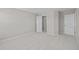 Spacious bedroom with gray walls, carpet, and double closets at 4988 Amber Crest Dr, Brownsburg, IN 46112