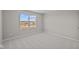 Bright bedroom with window overlooking construction at 4988 Amber Crest Dr, Brownsburg, IN 46112