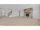 Spacious living room with a stone fireplace and hardwood floors at 4988 Amber Crest Dr, Brownsburg, IN 46112