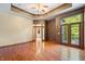 Hardwood floor bedroom with French doors leading to the backyard at 12980 W Mt. Healthy Rd, Columbus, IN 47201