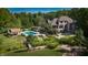 Aerial view showcasing house and expansive backyard oasis at 12980 W Mt. Healthy Rd, Columbus, IN 47201
