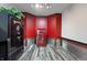 Finished room with two safes and red walls at 12980 W Mt. Healthy Rd, Columbus, IN 47201