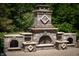 Elegant outdoor stone fireplace at 12980 W Mt. Healthy Rd, Columbus, IN 47201