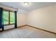Simple bedroom with neutral walls and carpeting at 12980 W Mt. Healthy Rd, Columbus, IN 47201