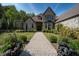 Stone house entrance with walkway and landscaping at 12980 W Mt. Healthy Rd, Columbus, IN 47201