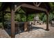 Pergola with outdoor kitchen and seating at 12980 W Mt. Healthy Rd, Columbus, IN 47201