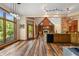 Spacious kitchen featuring stainless steel appliances and hardwood floors at 12980 W Mt. Healthy Rd, Columbus, IN 47201