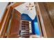 Bright office with blue walls, wood built-ins, and vaulted ceiling at 12980 W Mt. Healthy Rd, Columbus, IN 47201
