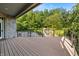 Spacious deck overlooks a tranquil stream and lush woods at 12980 W Mt. Healthy Rd, Columbus, IN 47201