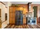 Modern kitchen with stainless steel appliances and wood cabinets at 12980 W Mt. Healthy Rd, Columbus, IN 47201