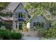 Charming stone house exterior with a fountain and landscaping at 12980 W Mt. Healthy Rd, Columbus, IN 47201