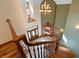 Grand entryway with a curved staircase and chandelier at 12980 W Mt. Healthy Rd, Columbus, IN 47201