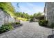 Large backyard patio with fire pit and landscaping at 12980 W Mt. Healthy Rd, Columbus, IN 47201