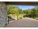 Spacious deck overlooking a tranquil backyard landscape at 12980 W Mt. Healthy Rd, Columbus, IN 47201