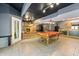 Game room with pool table and wet bar at 12980 W Mt. Healthy Rd, Columbus, IN 47201