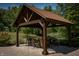 Pergola with stone bar and seating area at 12980 W Mt. Healthy Rd, Columbus, IN 47201