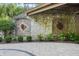Stone patio with landscaping and brick accents at 12980 W Mt. Healthy Rd, Columbus, IN 47201