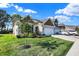 Attractive brick home with 2-car garage and yard at 8711 Faulkner Dr, Indianapolis, IN 46239