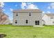 Two-story house with gray siding and a backyard patio at 10206 Carya Ct, Indianapolis, IN 46259